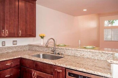 Kitchen opens up to the dining area and family roo