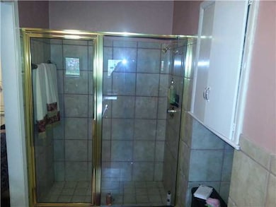 Mastersuite shower is large enough for two people.