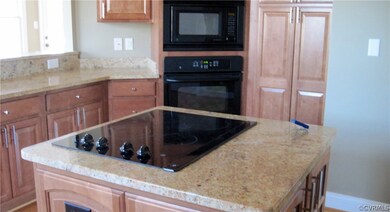 Granite Counters & Raised Panel Kitchen Cabinets