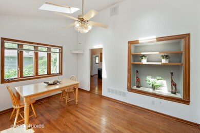LIGHT AND BRIGHT DINING AREA WITH HARDWOOD FLOORS