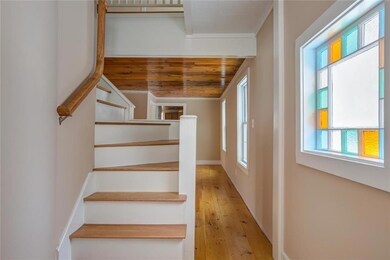 2nd floor offers 2 bedrooms & 1 bath.