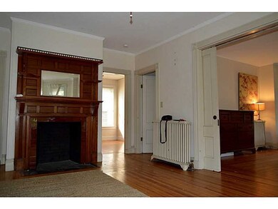 Living Room. On the right of the fireplace is the