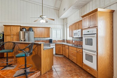 Kitchen bar seating with granite counters