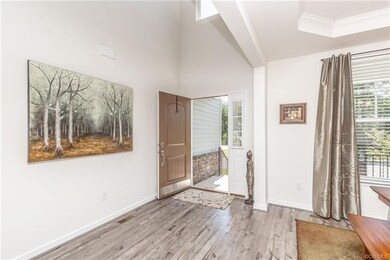 Open and bright 2 story foyer welcomes you in
