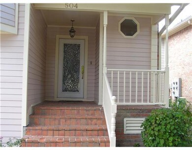 Photo. Inviting spacious porch with beautiful lead