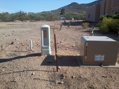 NW corner with Power, Com and hose bib