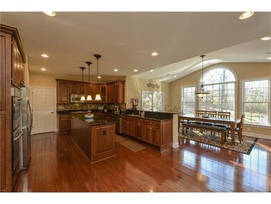 Chef's Kitchen complete with custom cabinets, hard