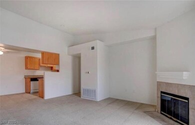 Unfurnished living room with light colored carpet,