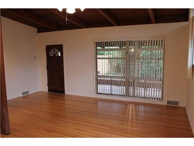 Gorgeous refinished Hardwood floors in living room