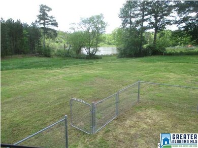 Back view. Pond is on a neighbor's yard.