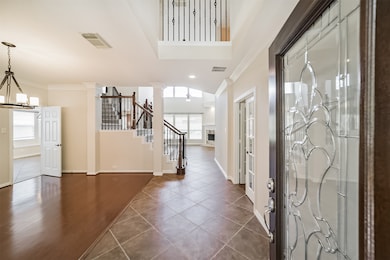 Upon entering you will find a two story open foyer