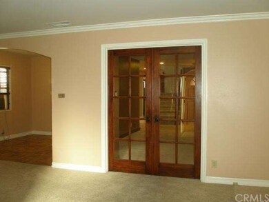 Looking from Entry/Living Room thru French Doors t