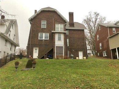 Rear Exterior of Home & Yard