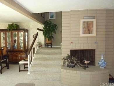 Living room Fireplace and part of the formal dinin