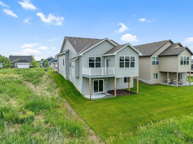 Home is complete with finished maintenance free decking, aluminum railing and concrete patio off the lower level walkout