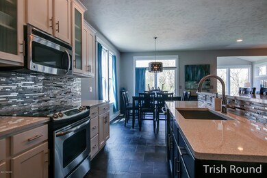 7743 Carliele Crossings Blvd SW unit 2, Byron Center, MI 49315 - photo 5