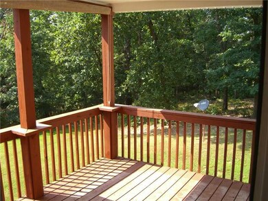 Exterior Back. back yard from covered deck