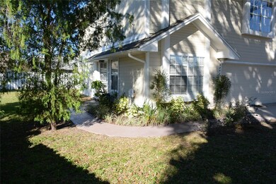 Front walkway leading from the driveway to the private side entrance