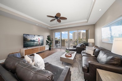 Living Room with Hurricane Rated sliders leading out to balcony