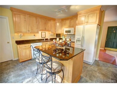 Kitchen - Maple cabinets, granite counters with un
