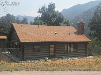 Log home with a mountain view
