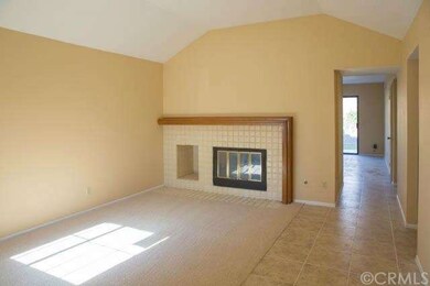 The Living Room with Fireplace.