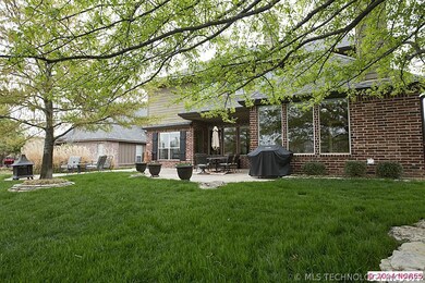 Professional landscaping with sprinkler system sur
