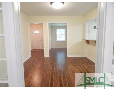 Dining Room. Interior French doors open from the f