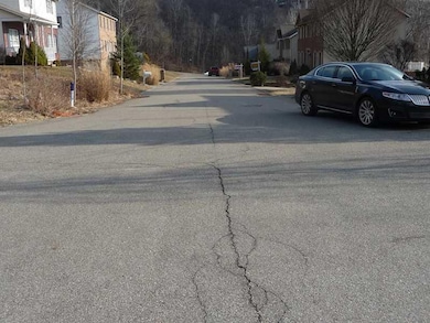 Other. street scene looking down w/lot on left sid