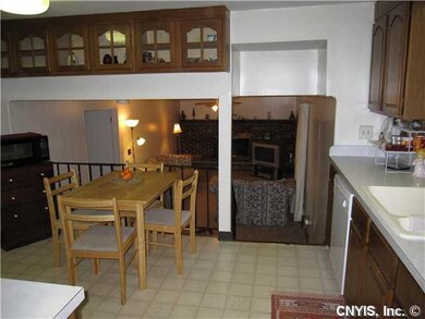 Kitchen. Open kitchen with newer refrigerator.