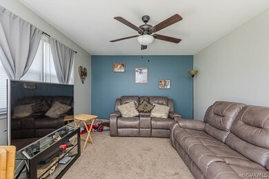 FAMILY ROOM W/ CEILING FAN, LARGE WINDOW