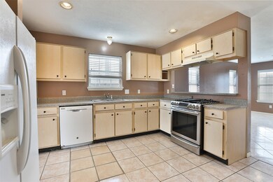 9042 Mcgallion Rd, Houston, TX 77022 - photo 7