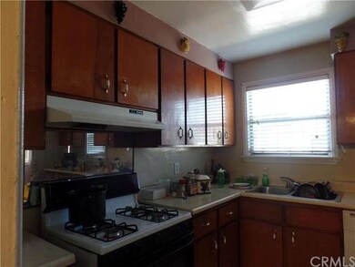 FRONT HOUSE HAS A GOOD SIZE KITCHEN