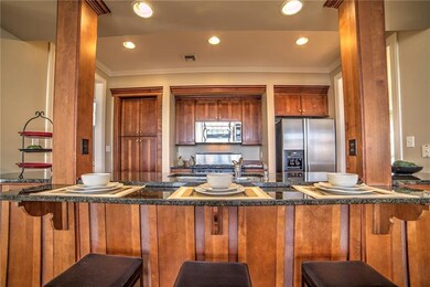 A close-up of the kitchen bar area (family room is
