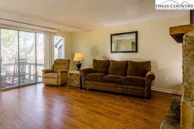 The living room opens directly to the deck.