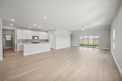 Photo is not of the actual home, but is an inspirational photo of builder’s model home and may depict options, furnishings, and/or decorator features that are not included.