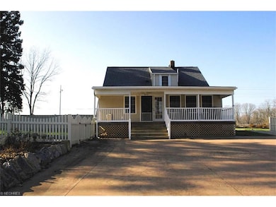 Fabulous back porch and stamped concrete driveway 