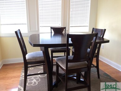 DINING ROOM WITH HARDWOOD FLOORS