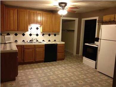 Kitchen is very spacious and has additional dining