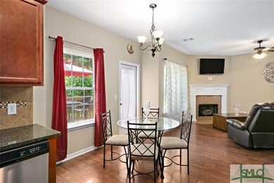 BREAKFAST AREA OPEN TO GREAT ROOM AND KITCHEN WITH