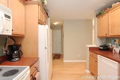 716 Stevenspoint SE unit 30, Byron Center, MI 49315 - photo 5