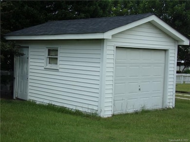 Storage/shop with roll up door.
