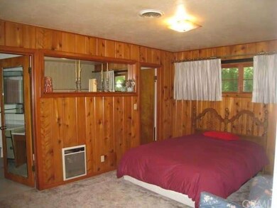 Spacious master bedroom with walk-in closet and ac