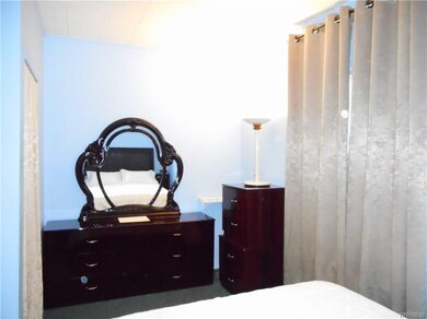 First floor Bedroom has closet to the left and wal