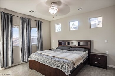 Master Bedroom Downstairs with Tile Flooring.