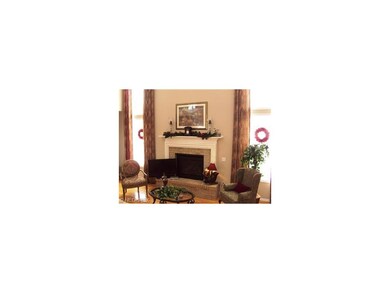 Great Room fireplace flanked by floor to (2 story)