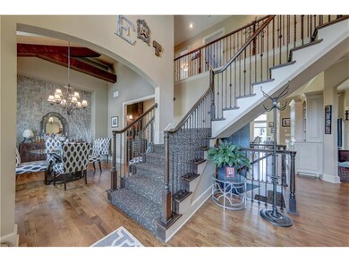 Grand two story Foyer adjoining formal dinning roo