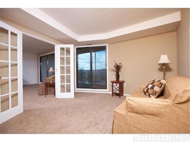 Second bedroom has french doors and a sliding door