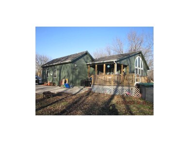 Taken from the southwest with the covered deck and