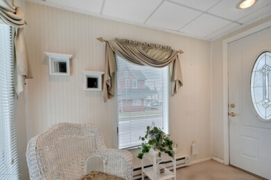 ENCLOSED HEATED FRONT PORCH